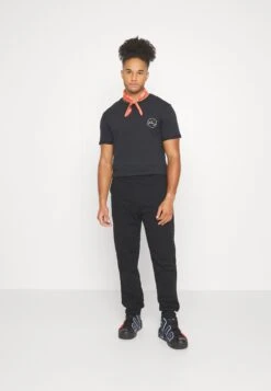 Pier One T-shirt Z Nadrukiem - Black 16 Pier One T-shirt Z Nadrukiem - Black -Pier One 60750615dff74ec3bcd929c14f66c38d